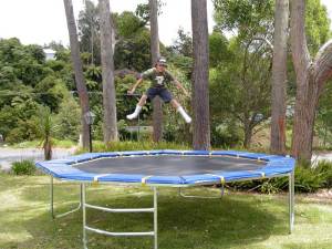 Bouncing on the trampoline at Hone Heke Lodge Kerikeri backpackers
