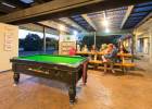 The pool table at Hone Heke Lodge backpackers Kerikeri is always popular