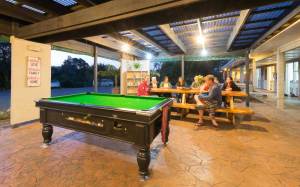 The pool table at Hone Heke Lodge backpackers Kerikeri is always popular
