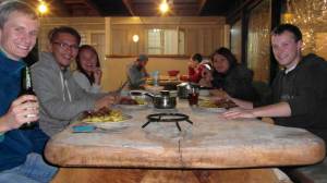 Sharing dinner at Hone Heke Lodge backpackers Kerikeri