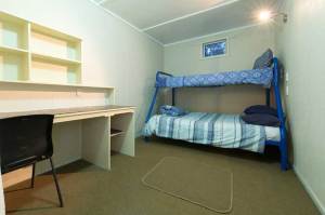 Kerikeri budget accommodation private double room. Single bunk above, double bed below.